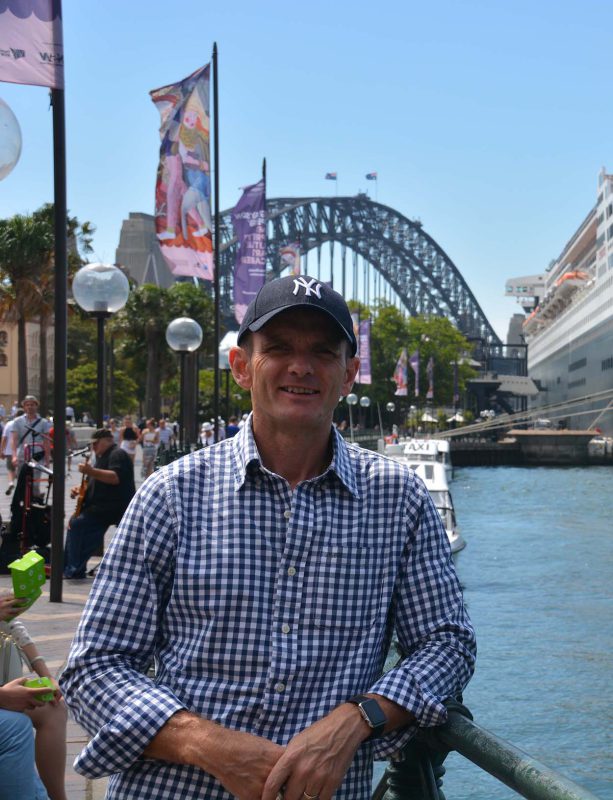 Graeme in Sydney Harbour with Sydney harbour bridge in background